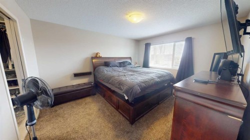 983 Auburn Bay Boulevard Se, Calgary, AB - Indoor Photo Showing Bedroom
