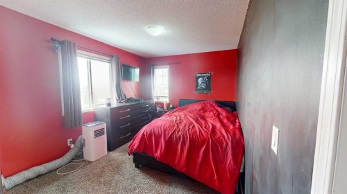 983 Auburn Bay Boulevard Se, Calgary, AB - Indoor Photo Showing Bedroom