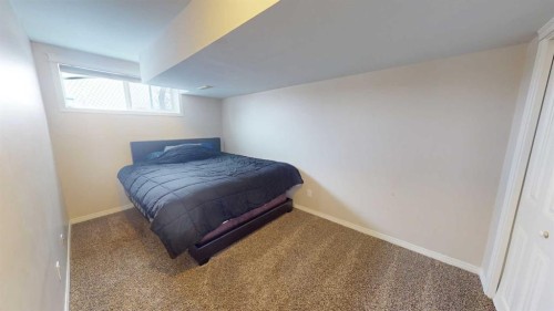 983 Auburn Bay Boulevard Se, Calgary, AB - Indoor Photo Showing Bedroom