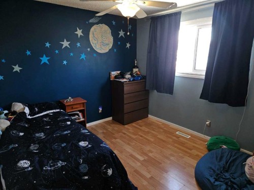 60 Erin Croft Place Se, Calgary, AB - Indoor Photo Showing Bedroom