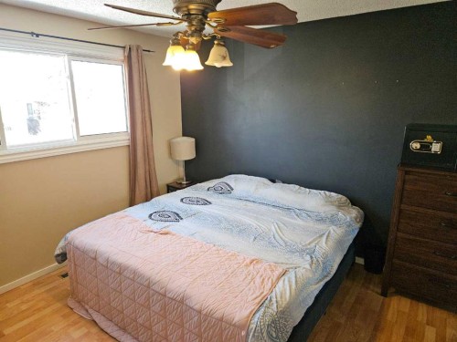 60 Erin Croft Place Se, Calgary, AB - Indoor Photo Showing Bedroom