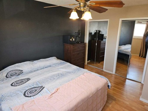 60 Erin Croft Place Se, Calgary, AB - Indoor Photo Showing Bedroom