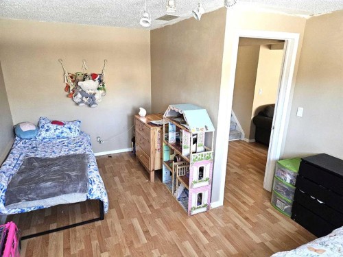 60 Erin Croft Place Se, Calgary, AB - Indoor Photo Showing Bedroom