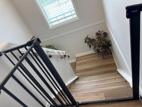 8-304 Ross Avenue, Cochrane, AB - Indoor Photo Showing Other Room