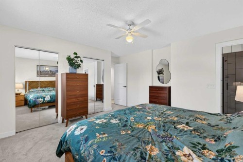 584 Woodhill Place Sw, Calgary, AB - Indoor Photo Showing Bedroom