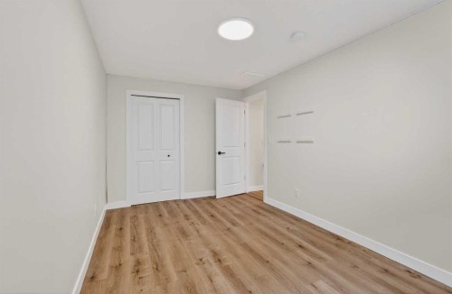 584 Woodhill Place Sw, Calgary, AB - Indoor Photo Showing Other Room