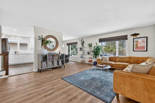 584 Woodhill Place Sw, Calgary, AB - Indoor Photo Showing Living Room