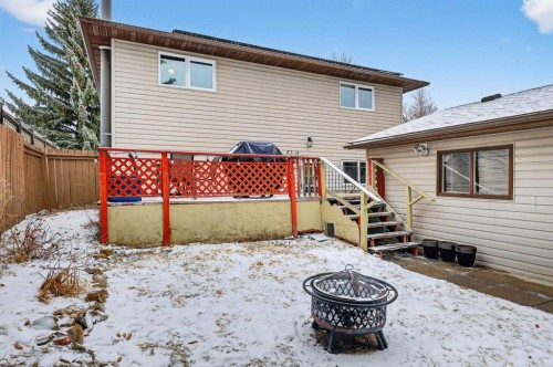 584 Woodhill Place Sw, Calgary, AB - Outdoor With Deck Patio Veranda With Exterior