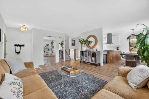 584 Woodhill Place Sw, Calgary, AB - Indoor Photo Showing Living Room