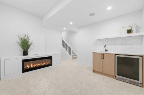 1-521 15 Avenue Ne, Calgary, AB - Indoor With Fireplace