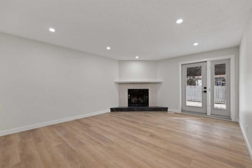 2031 24 Avenue Ne, Calgary, AB - Indoor With Fireplace