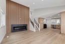 2031 24 Avenue Ne, Calgary, AB  - Indoor With Fireplace 