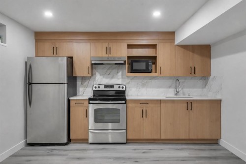 52 Saddlecreek Terrace, Calgary, AB - Indoor Photo Showing Kitchen