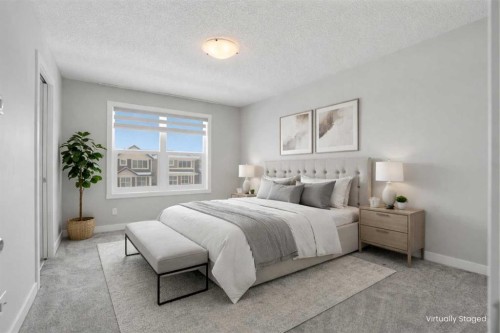 747 Creekside Boulevard Sw, Calgary, AB - Indoor Photo Showing Bedroom