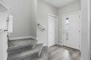 747 Creekside Boulevard Sw, Calgary, AB  - Indoor Photo Showing Other Room 