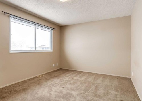 8 Castlepark Way Ne, Calgary, AB - Indoor Photo Showing Other Room