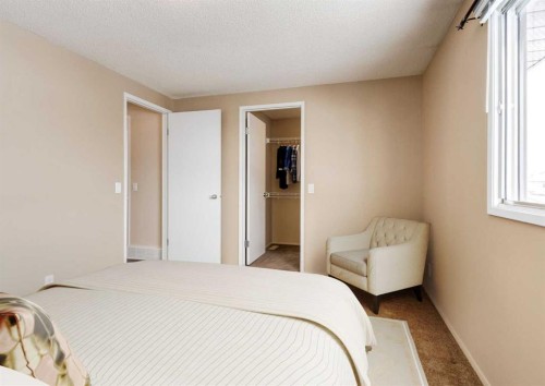 8 Castlepark Way Ne, Calgary, AB - Indoor Photo Showing Bedroom