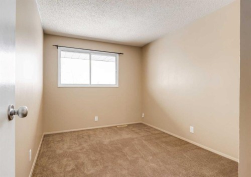 8 Castlepark Way Ne, Calgary, AB - Indoor Photo Showing Other Room