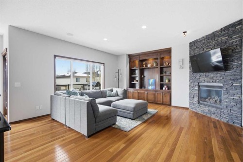 126 Pantego Way Nw, Calgary, AB - Indoor Photo Showing Living Room With Fireplace