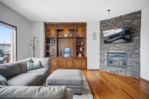 126 Pantego Way Nw, Calgary, AB - Indoor Photo Showing Living Room With Fireplace