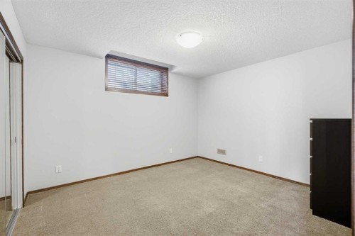 126 Pantego Way Nw, Calgary, AB - Indoor Photo Showing Other Room