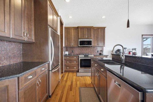 126 Pantego Way Nw, Calgary, AB - Indoor Photo Showing Kitchen With Stainless Steel Kitchen With Double Sink With Upgraded Kitchen