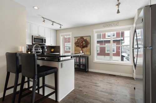 507 Cranford Walk Se, Calgary, AB - Indoor Photo Showing Kitchen