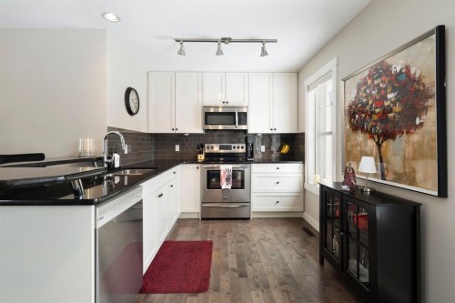 507 Cranford Walk Se, Calgary, AB - Indoor Photo Showing Kitchen With Upgraded Kitchen