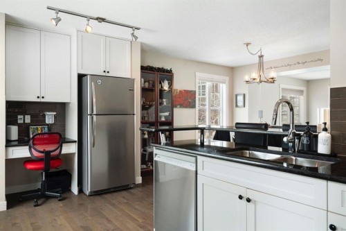 507 Cranford Walk Se, Calgary, AB - Indoor Photo Showing Kitchen With Double Sink