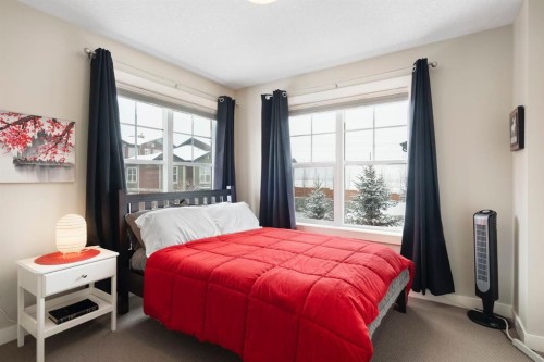 507 Cranford Walk Se, Calgary, AB - Indoor Photo Showing Bedroom