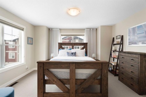 507 Cranford Walk Se, Calgary, AB - Indoor Photo Showing Bedroom
