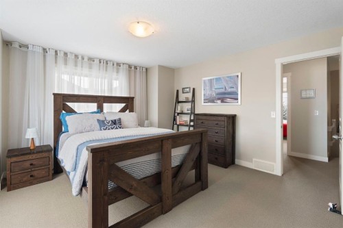 507 Cranford Walk Se, Calgary, AB - Indoor Photo Showing Bedroom