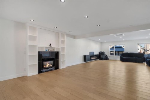 278 Saddlefield Place Ne, Calgary, AB - Indoor Photo Showing Living Room With Fireplace