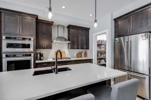 230 Nolanhurst Bay Nw, Calgary, AB - Indoor Photo Showing Kitchen With Stainless Steel Kitchen With Double Sink With Upgraded Kitchen