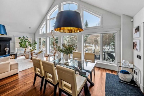 23 Spring Willow Way Sw, Calgary, AB - Indoor Photo Showing Other Room With Fireplace