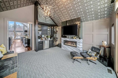 23 Spring Willow Way Sw, Calgary, AB - Indoor With Fireplace