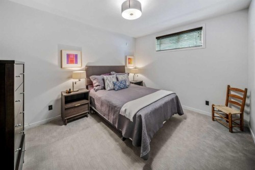 23 Spring Willow Way Sw, Calgary, AB - Indoor Photo Showing Bedroom
