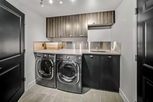 23 Spring Willow Way Sw, Calgary, AB - Indoor Photo Showing Laundry Room