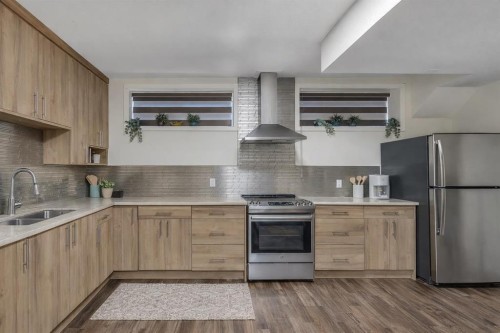 272 Aspenmere Way, Chestermere, AB - Indoor Photo Showing Kitchen With Double Sink