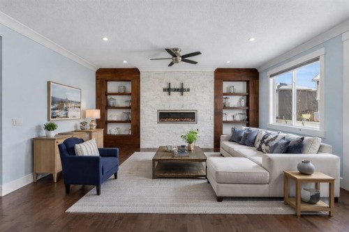 272 Aspenmere Way, Chestermere, AB - Indoor Photo Showing Living Room With Fireplace
