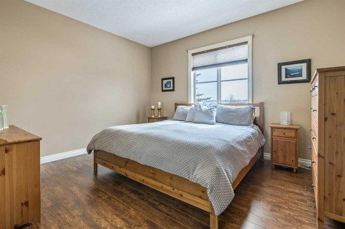 79 Tucker Circle, Okotoks, AB - Indoor Photo Showing Bedroom