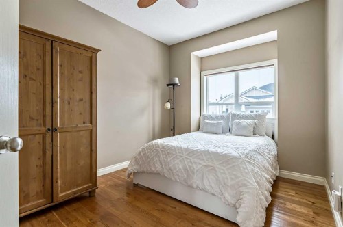 79 Tucker Circle, Okotoks, AB - Indoor Photo Showing Bedroom