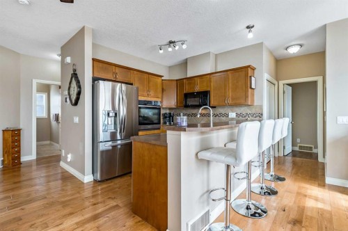 79 Tucker Circle, Okotoks, AB - Indoor Photo Showing Kitchen