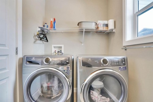 39 Panatella Road Nw, Calgary, AB - Indoor Photo Showing Laundry Room