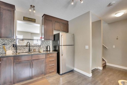 39 Panatella Road Nw, Calgary, AB - Indoor Photo Showing Kitchen
