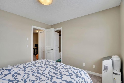 39 Panatella Road Nw, Calgary, AB - Indoor Photo Showing Bedroom
