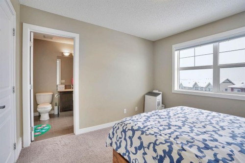 39 Panatella Road Nw, Calgary, AB - Indoor Photo Showing Bedroom