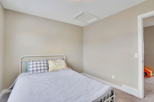 39 Panatella Road Nw, Calgary, AB - Indoor Photo Showing Bedroom