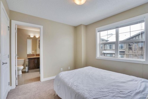 39 Panatella Road Nw, Calgary, AB - Indoor Photo Showing Bedroom
