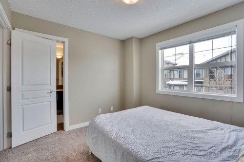 39 Panatella Road Nw, Calgary, AB - Indoor Photo Showing Bedroom